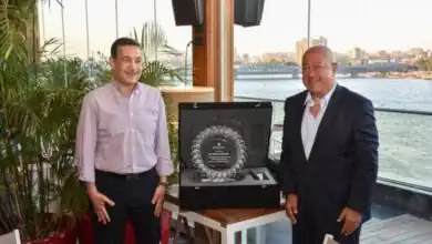 حفل وداع .. يحيى أبو الفتوح والعاملون ببنك التعمير والإسكان يودعون حسن غانم|صور